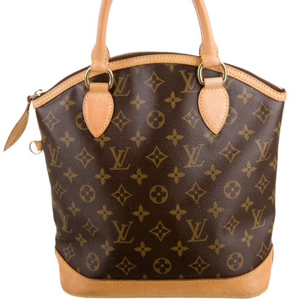 AUTHENTIC Louis Vuitton
Monogram Vertical Lockit